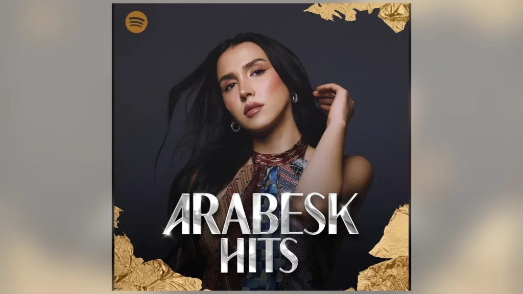 Spotify uygulamasında arabesk müzik dinleyen genç bir dinleyici